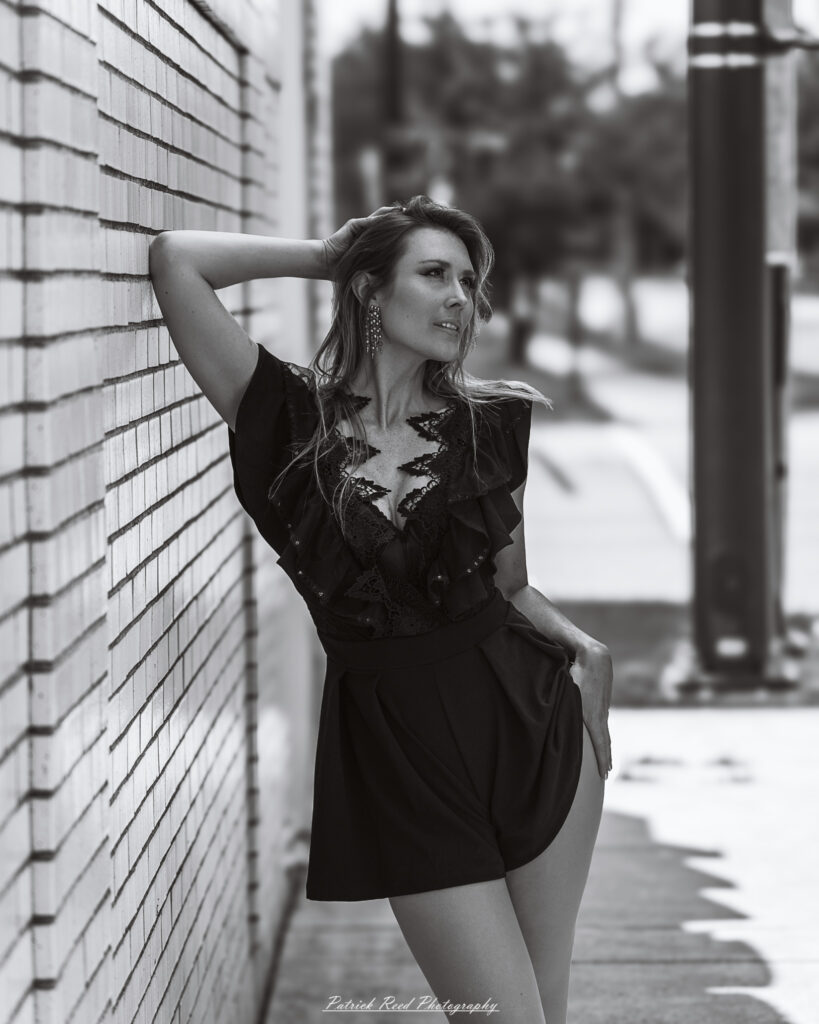 Natural light portrait of a model, photographed on June 28, 2025. She is posed outdoors with soft, flattering lighting, conveying a calm and confident expression.